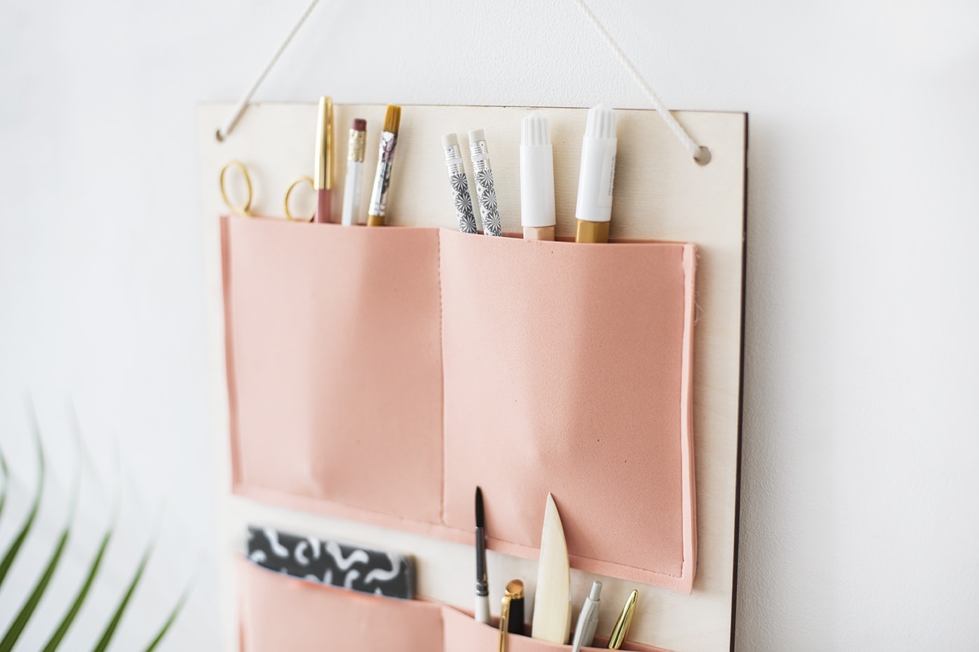 DIY hanging organiser made with plywood and foam pockets | organisation | easy craft ideas for the home or office