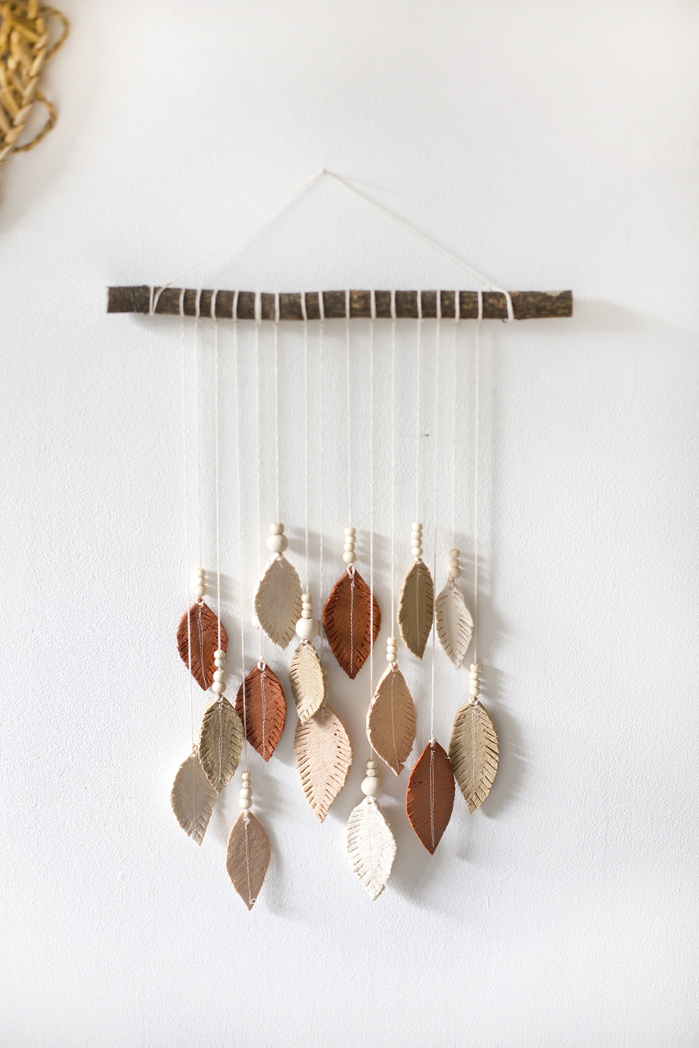 DIY Fimo Feather Wall Hanging
