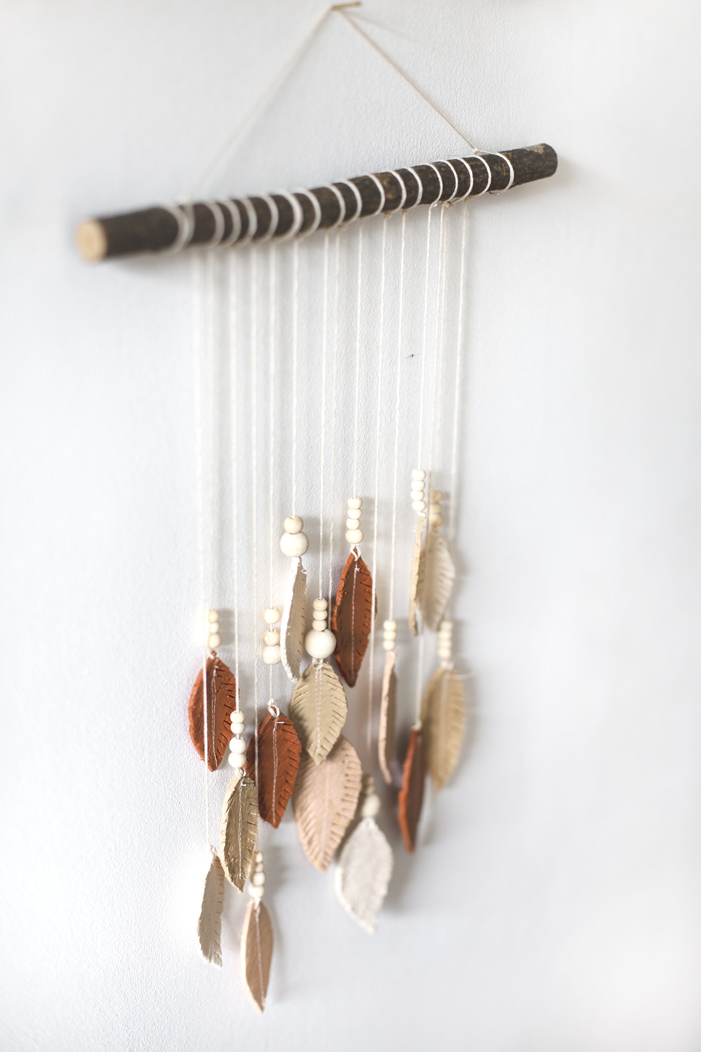 DIY Fimo Feather Wall Hanging